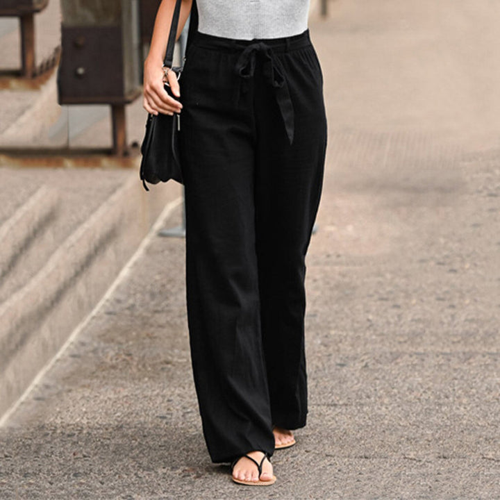 "Pantalon en lin beige pour femme avec coupe ajustée, confort et style, idéal pour toutes occasions, disponible en plusieurs 