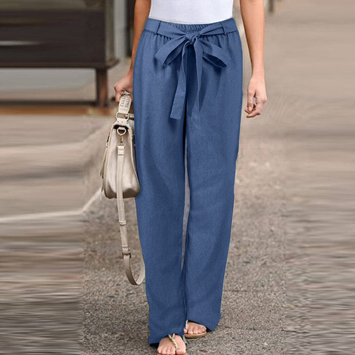 "Pantalon en lin beige pour femme avec coupe ajustée, confort et style, idéal pour toutes occasions, disponible en plusieurs 