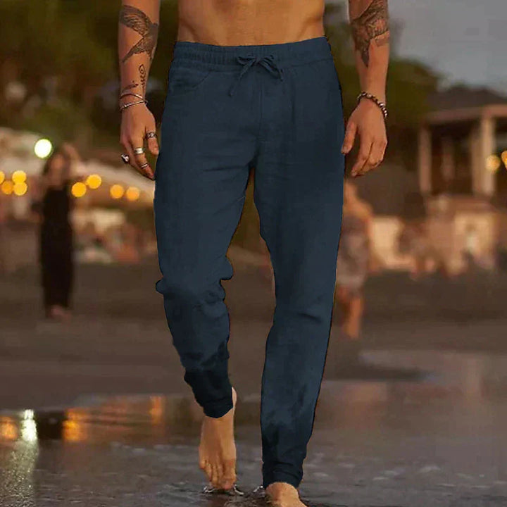 "Pantalon en lin décontracté pour homme, couleur beige, coupe droite, tissu léger et respirant pour été."