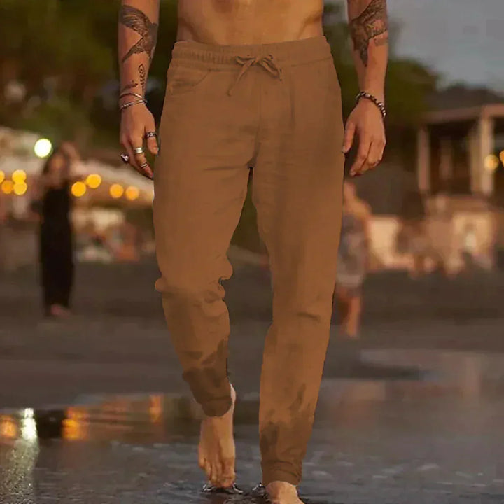 "Pantalon en lin décontracté pour homme, couleur beige, coupe droite, tissu léger et respirant pour été."