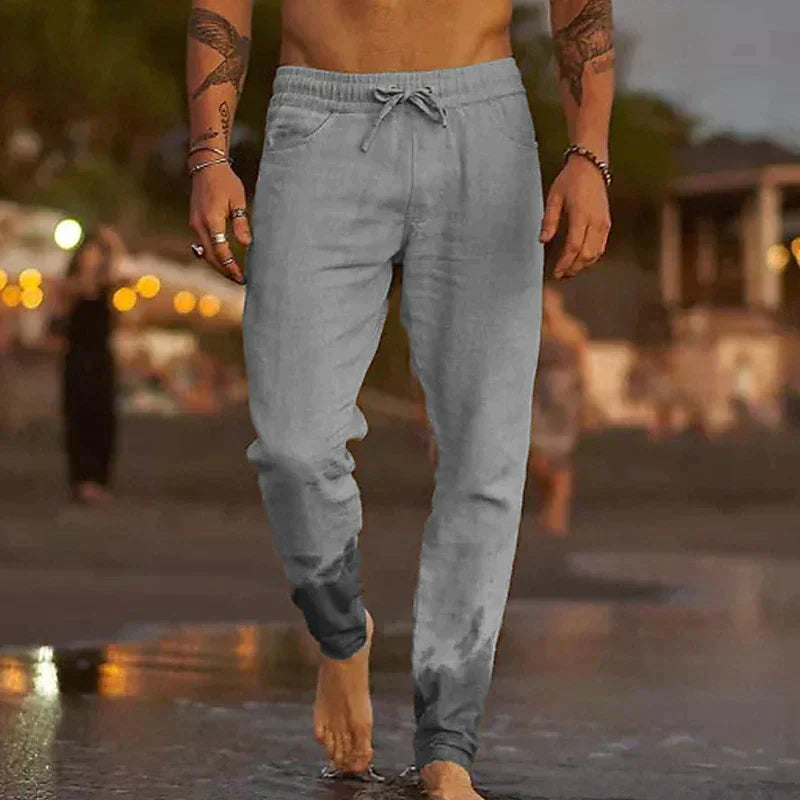 "Pantalon en lin décontracté pour homme, couleur beige, coupe droite, tissu léger et respirant pour été."