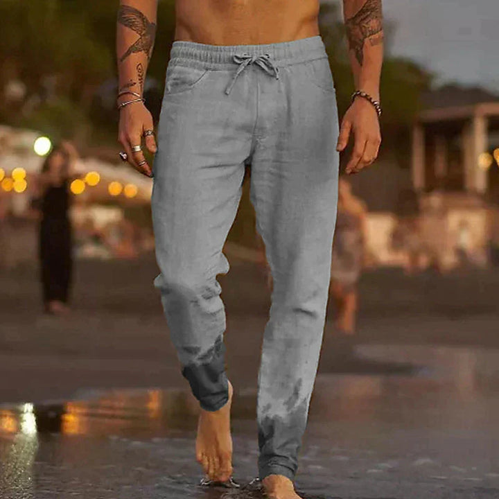 "Pantalon en lin décontracté pour homme, couleur beige, coupe droite, tissu léger et respirant pour été."