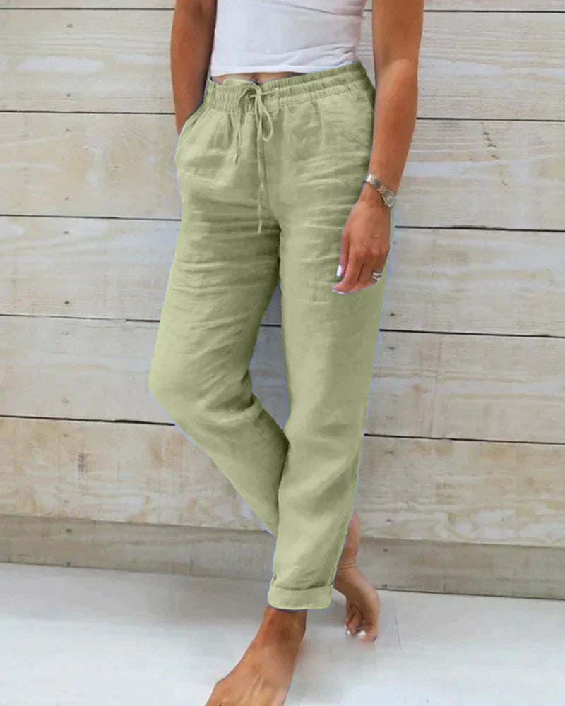 Pantalon en lin femme élégant, respirant, couleur beige, coupe flatteuse, idéal pour confort et style estival.