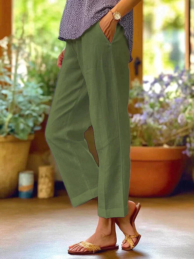 Pantalon en lin léger blanc pour femme, coupe fluide, taille élastique, idéal pour l'été et un confort optimal.