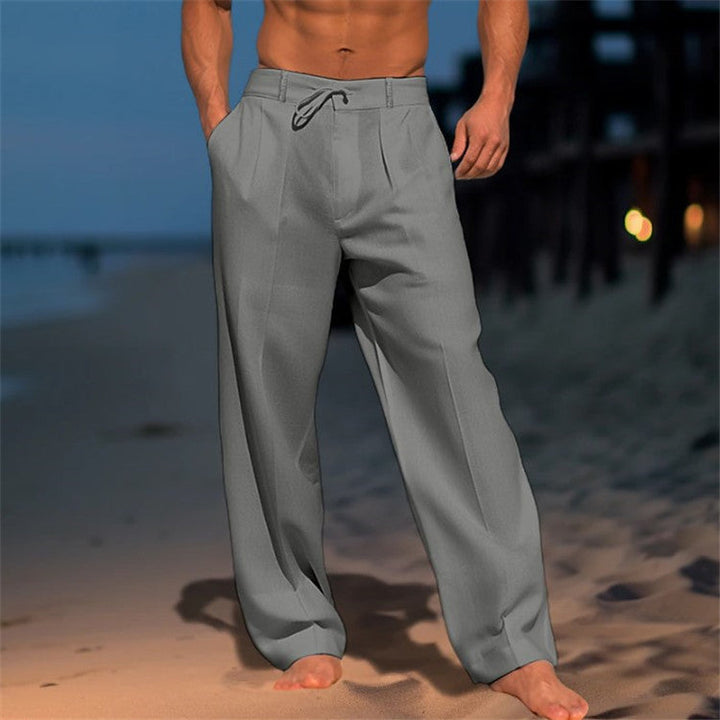"Pantalon en lin léger pour homme, coupe ample avec plis, cordon ajustable à la taille, idéal pour un style décontracté."