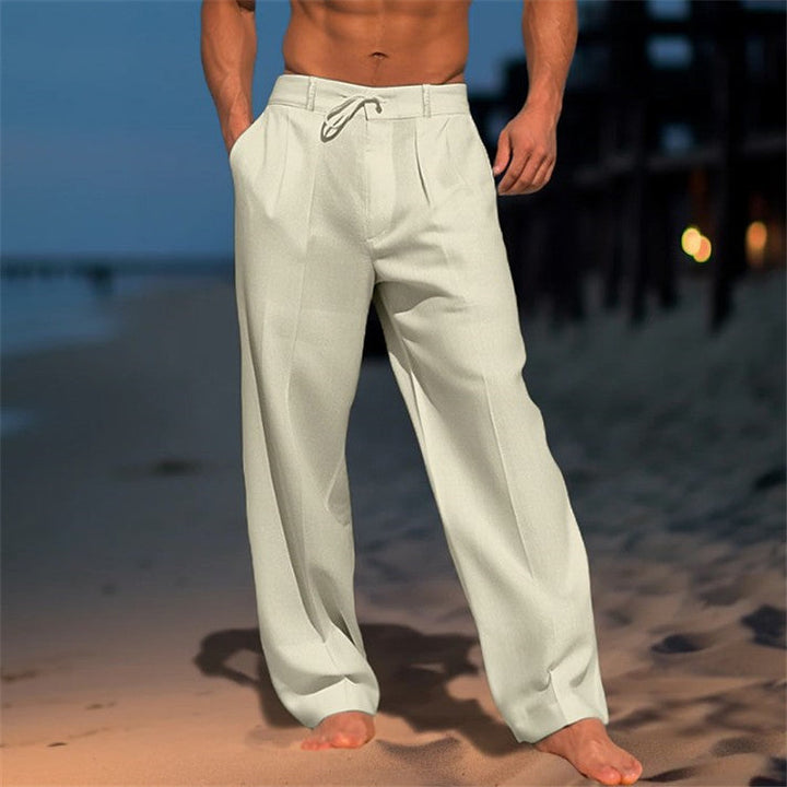"Pantalon en lin léger pour homme, coupe ample avec plis, cordon ajustable à la taille, idéal pour un style décontracté."