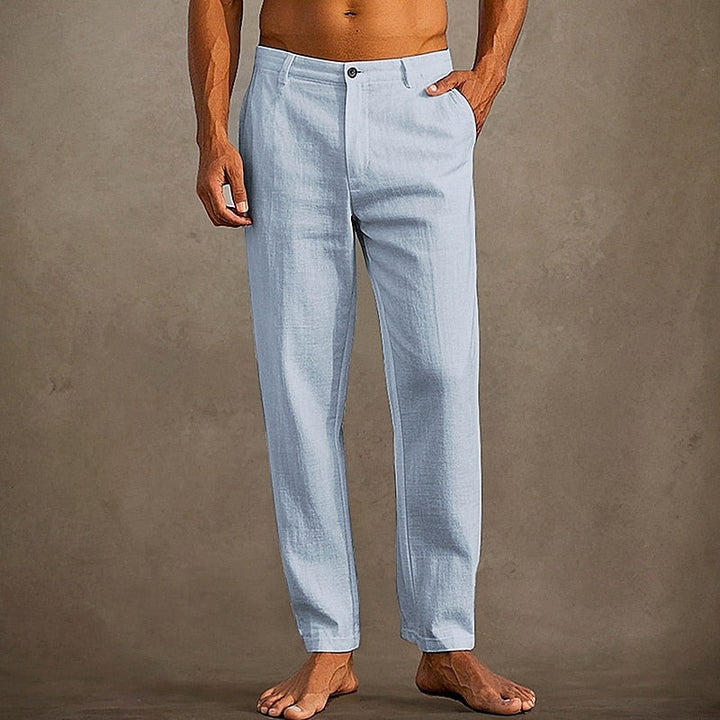 "Pantalon en lin léger pour homme, coupe décontractée, couleur estivale, idéal pour temps chaud."