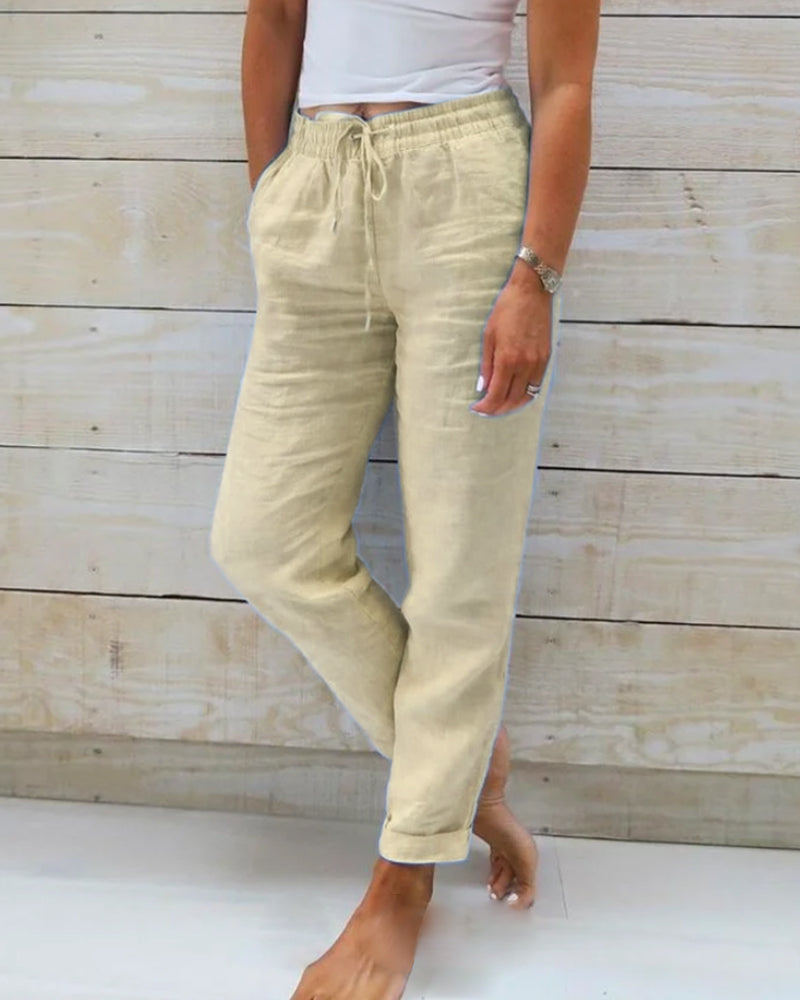 Pantalon en lin pour femme, jambe droite, taille haute, couleurs variées, style élégant, pratique avec poches latérales.