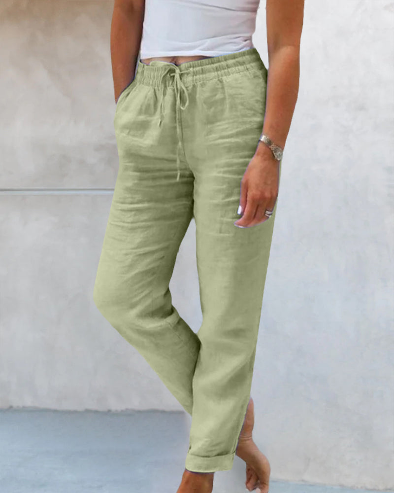 Pantalon en lin pour femme, jambe droite, taille haute, couleurs variées, style élégant, pratique avec poches latérales.