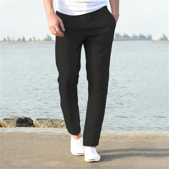 "Pantalon en lin pour homme, coupe droite, couleur unie, poches discrètes, léger et respirant, élégant et décontracté."