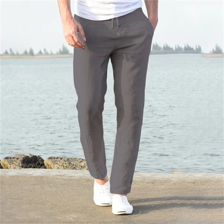 "Pantalon en lin pour homme, coupe droite, couleur unie, poches discrètes, léger et respirant, élégant et décontracté."