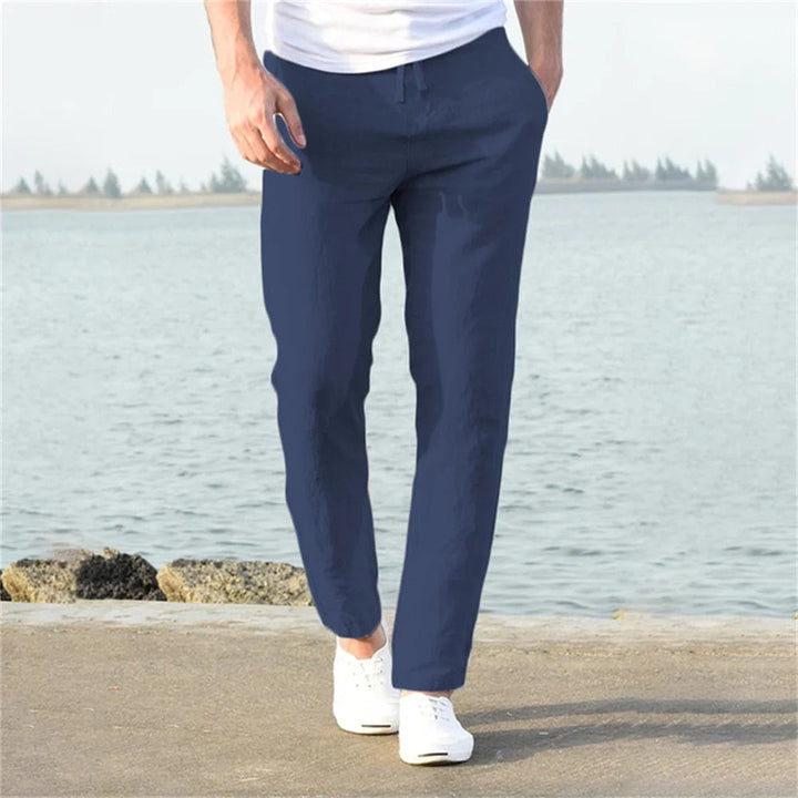 "Pantalon en lin pour homme, coupe droite, couleur unie, poches discrètes, léger et respirant, élégant et décontracté."
