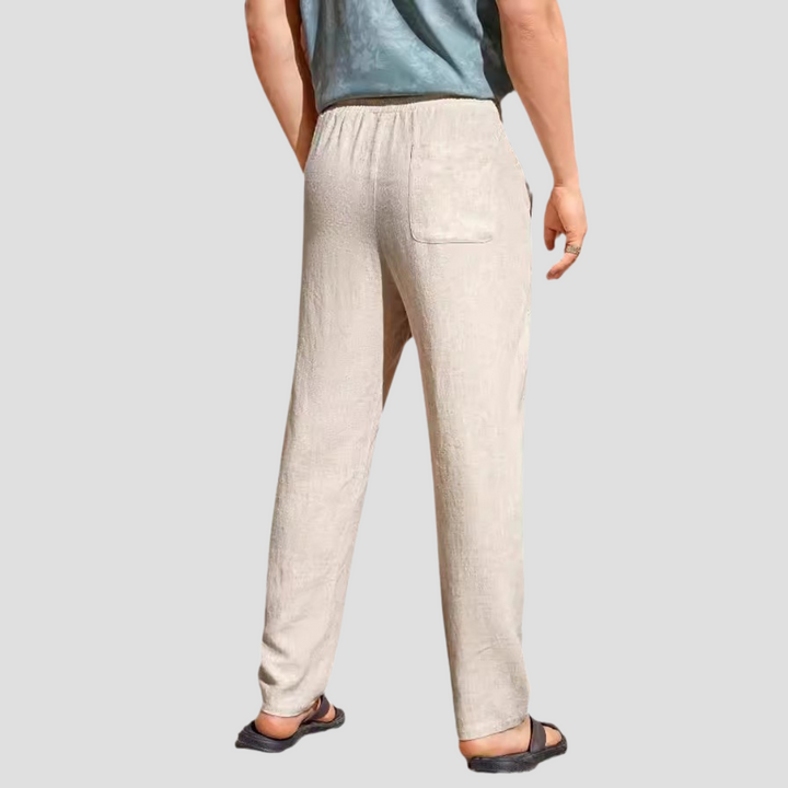 Pantalon en lin pour homme, coupe droite fluide, tissu respirant, cordon ajustable, style décontracté et élégant.