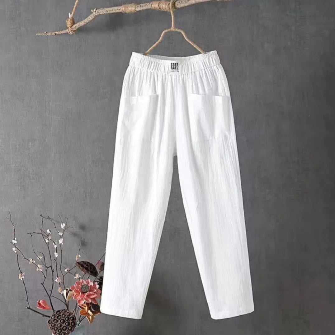 Pantalon femme en coton lin avec poches, taille élastique, coupe large pour un confort et style décontracté.