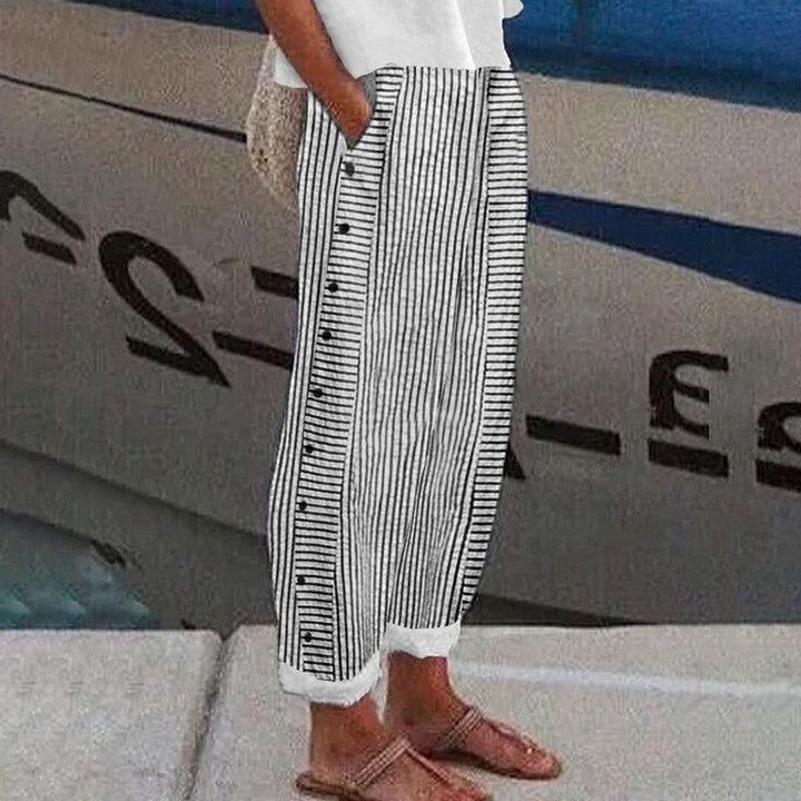 Pantalon femme décontracté Pia fluide, confortable avec poches latérales. Idéal pour un look casual chic et polyvalent.