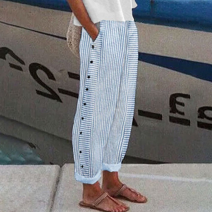 Pantalon Pia femme en tissu souple et respirant, parfait pour le confort quotidien. Style décontracté avec poches.