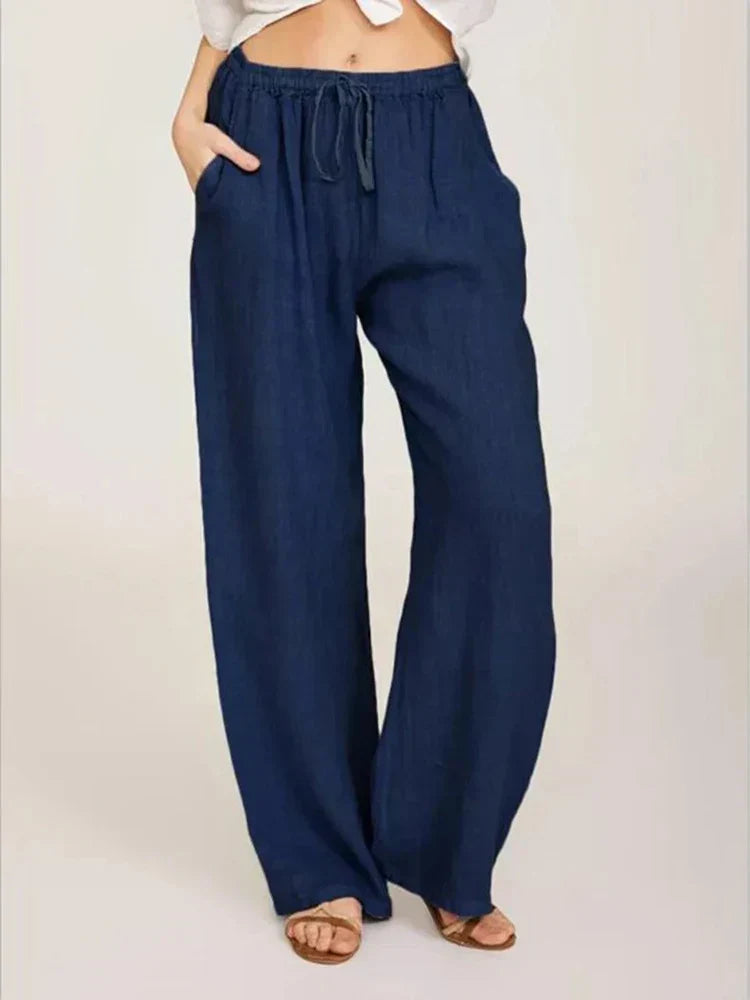 Pantalon femme élégant en lin et coton, coupe féminine, couleur noire, confort chic pour une allure raffinée.
