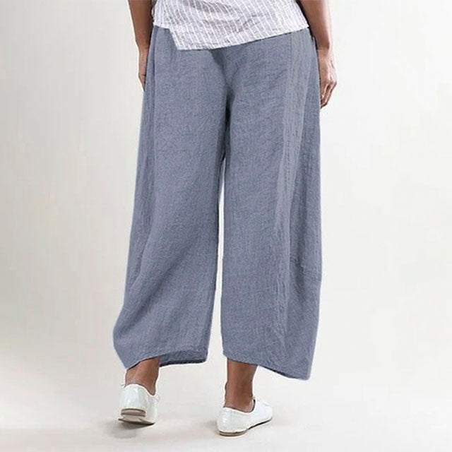 Pantalon femme en lin décontracté, léger, aéré, pour l'été, couleur sable, coupe ample, idéal pour les journées ensoleillées.