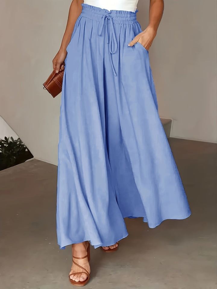 Pantalon femme jambe large élégant, idéal pour un look chic et confortable en toutes saisons.