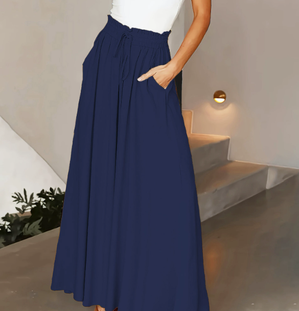 Pantalon femme toutes saisons, jambe large, taille élastique, parfait pour un look décontracté ou habillé.