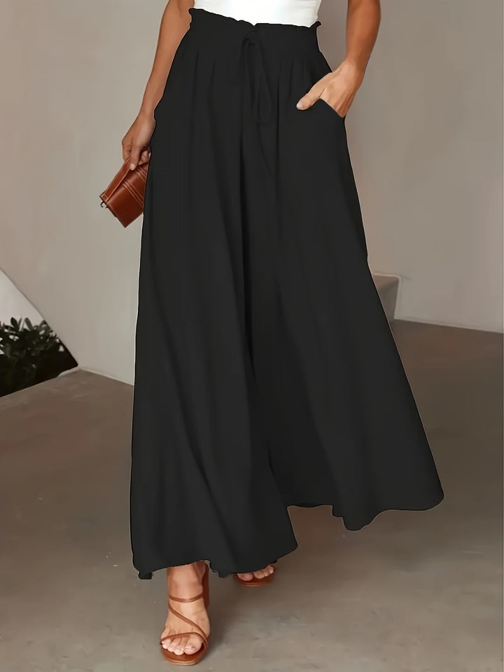Vêtement femme : pantalon long à coupe large, doux et confortable, pour un style élégant et polyvalent.