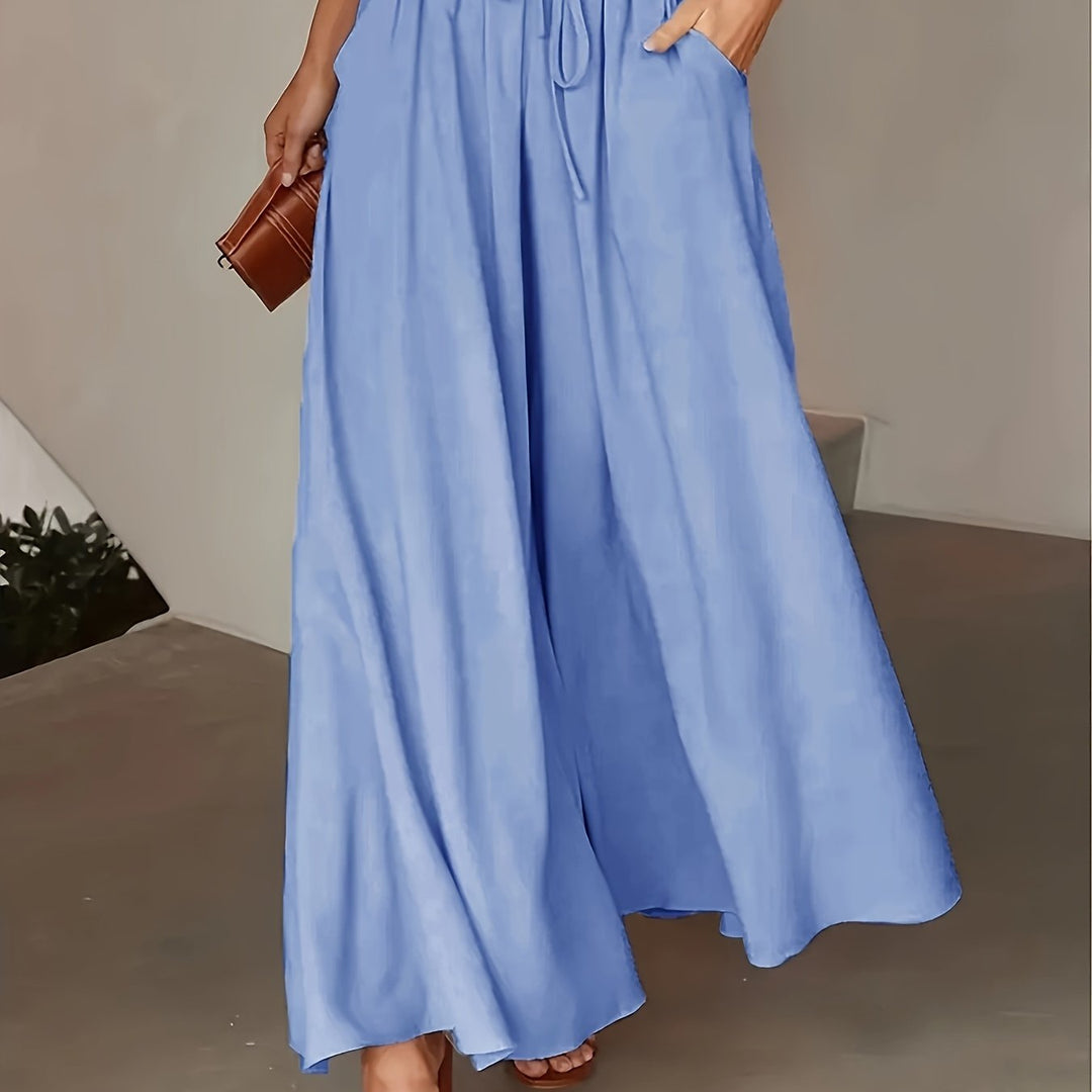 Pantalon long femme jambe large, polyvalent, confortable et élégant, parfait pour le travail ou les loisirs.