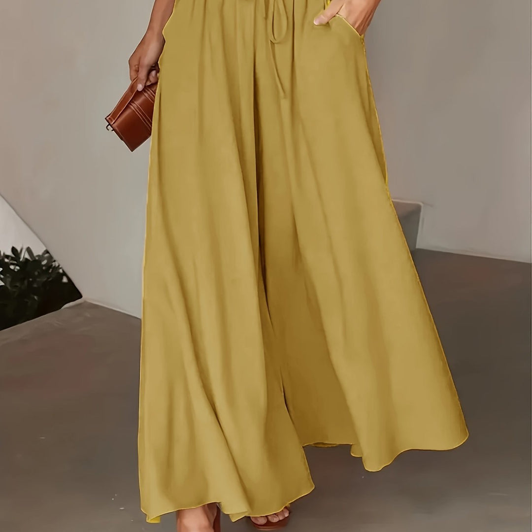 Vêtements femme : pantalon décontracté jambe large, taille haute élastique, confortable et stylé, toutes saisons.