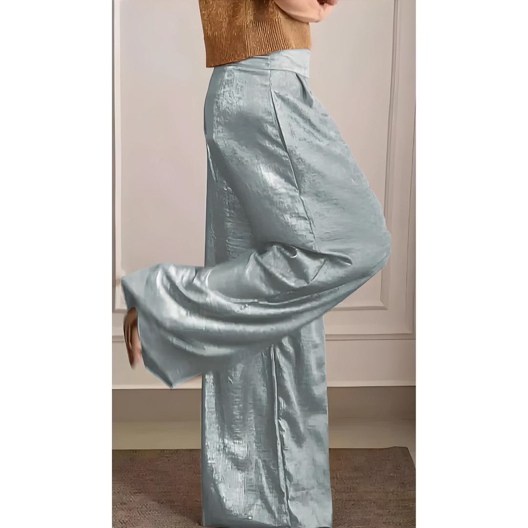 Pantalon fluide femme, taille haute et coupe large, parfait pour un style chic, élégant et moderne.