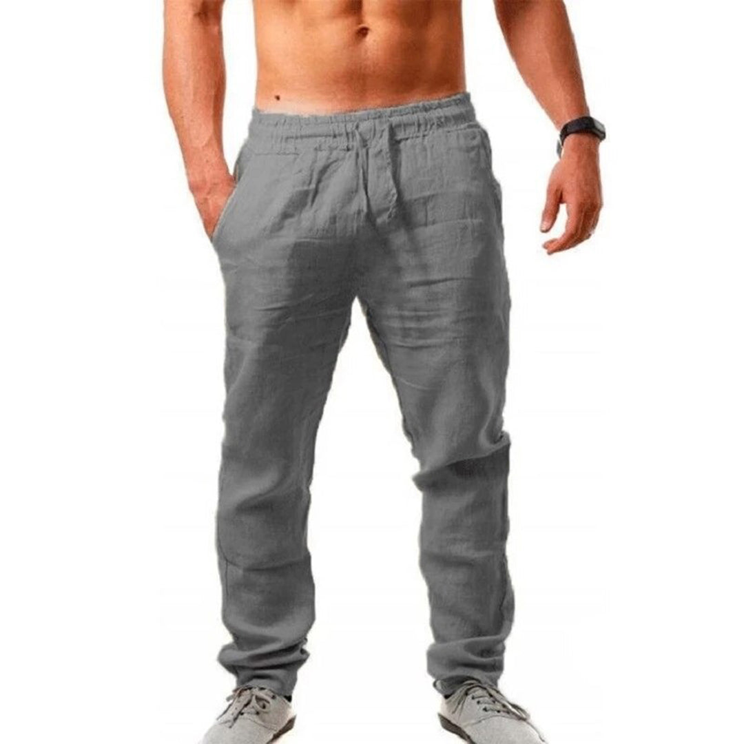 Pantalon fluide élégant homme, idéal pour un look décontracté-chic printemps-été. Confort et style.
