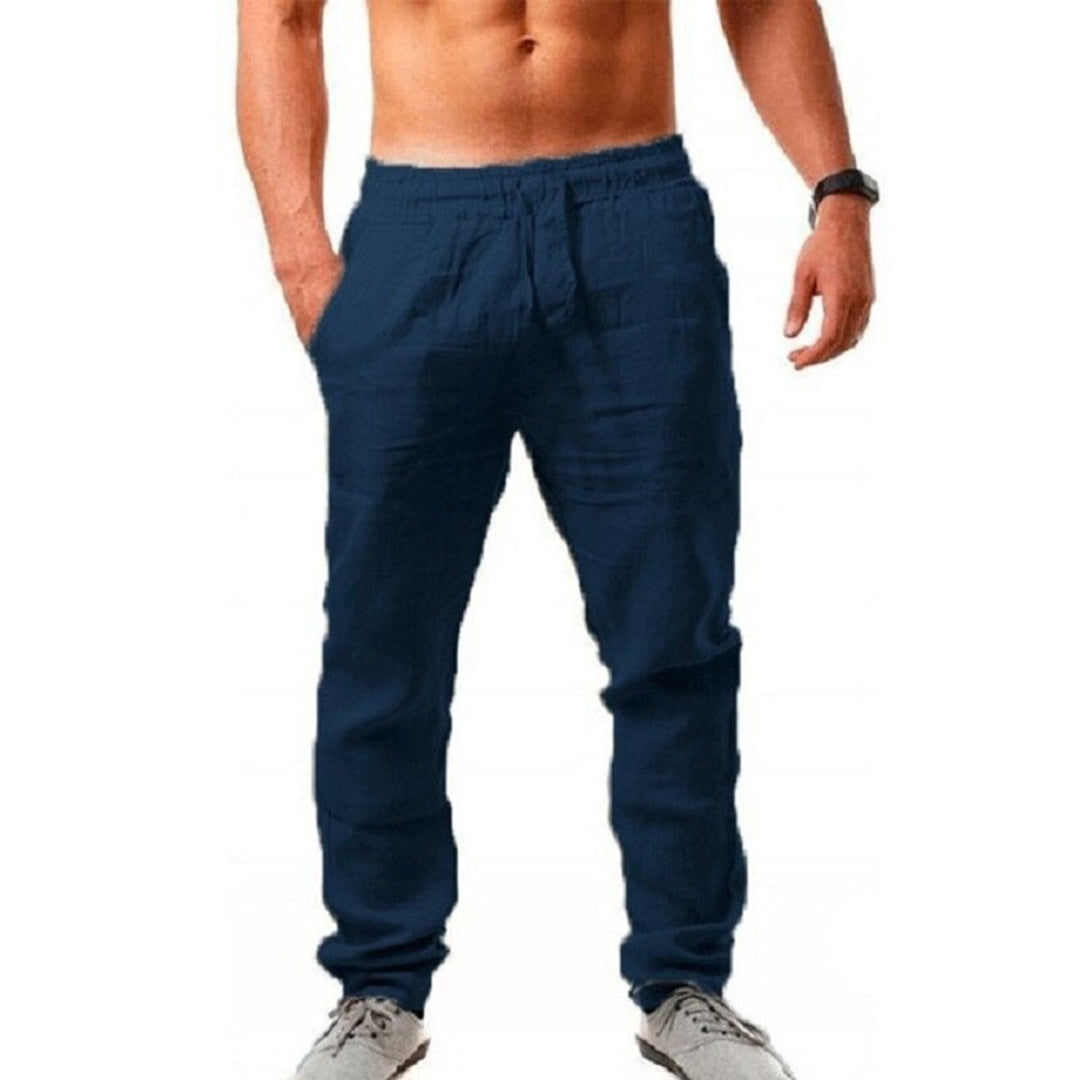 Pantalon homme fluide uni, polyvalent printemps-été. Élégant ou décontracté, confort assuré.