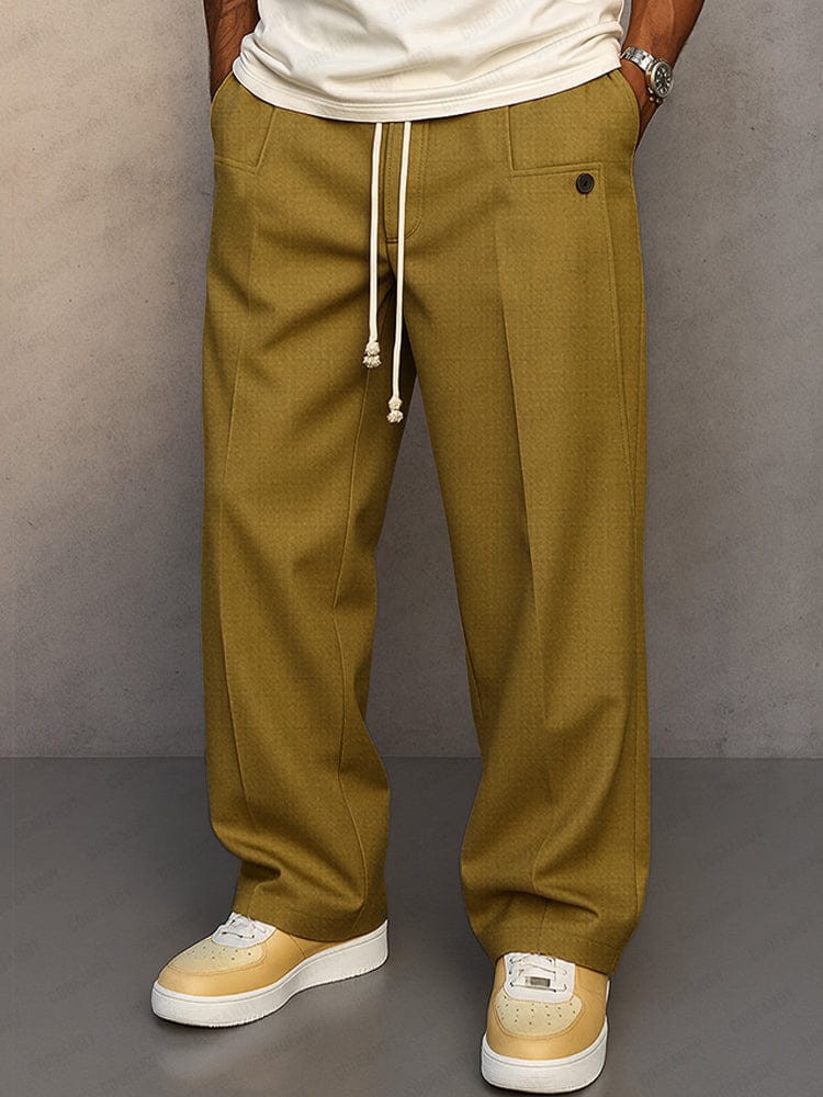 Pantalon homme ample en coton, taille élastique, idéal pour look casual et détente.
