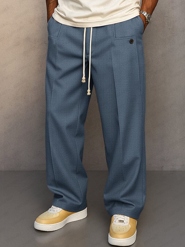 Pantalon uni homme en coton, coupe décontractée, jambe large, parfait pour le quotidien.