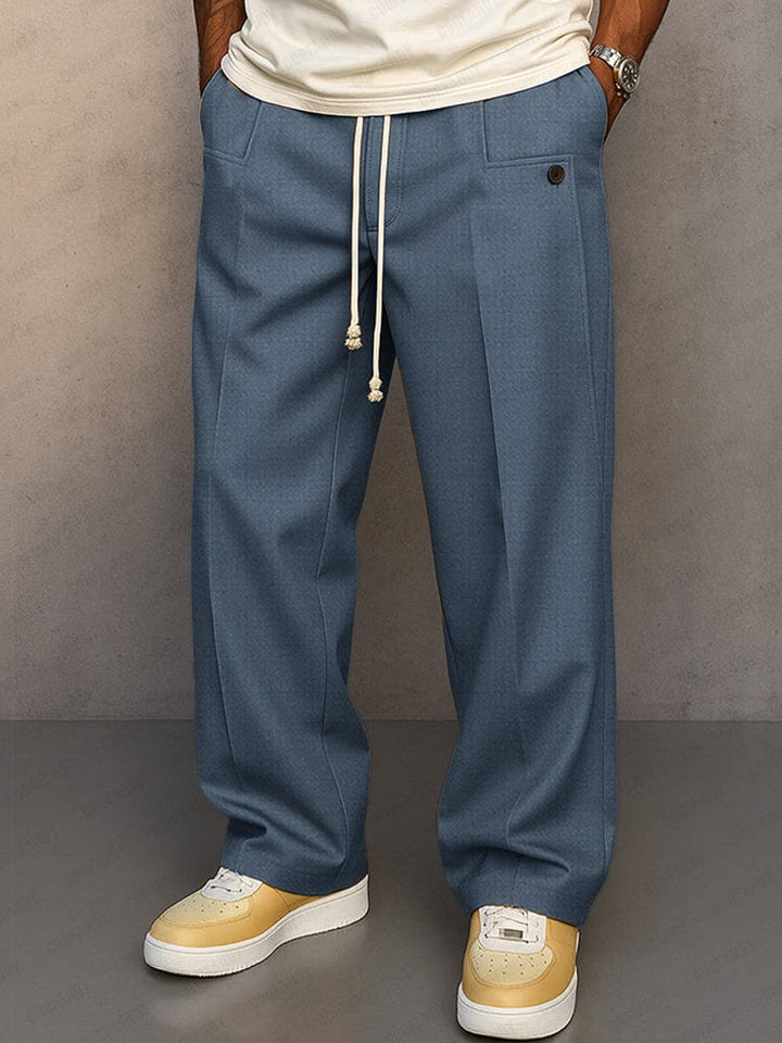 Pantalon uni homme en coton, coupe décontractée, jambe large, parfait pour le quotidien.
