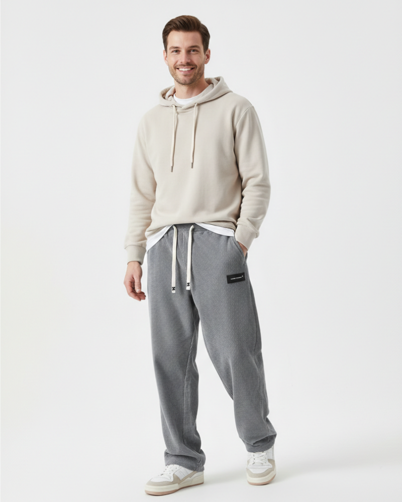 Pantalon homme confortable avec taille ajustable. Idéal pour automne/hiver, style décontracté et pratique avec poches.