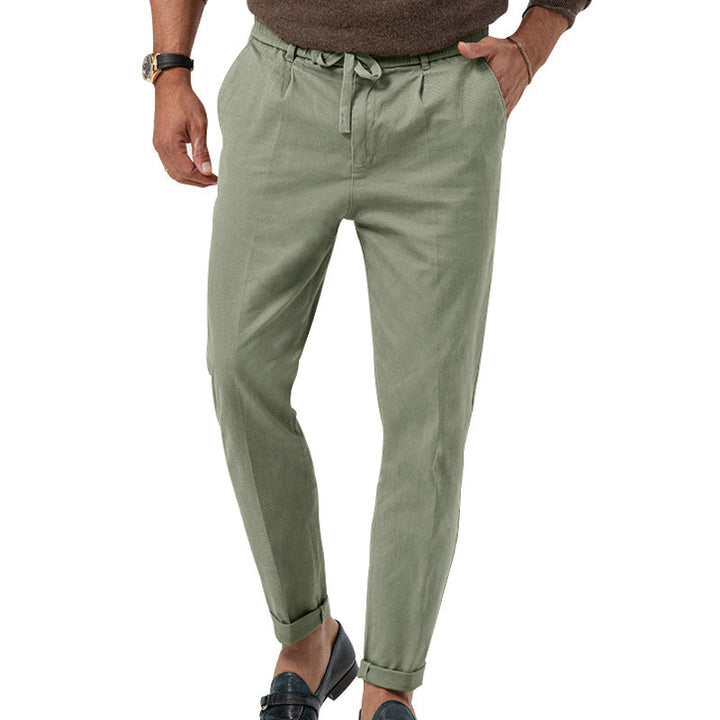 Pantalon homme lin beige, coupe droite, taille haute. Un classique intemporel pour toute occasion.