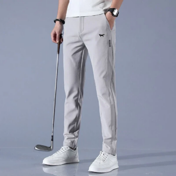 "Pantalon homme réversible, design élégant, tissu stretch, confort pour golf, léger et respirant, couleur neutre."