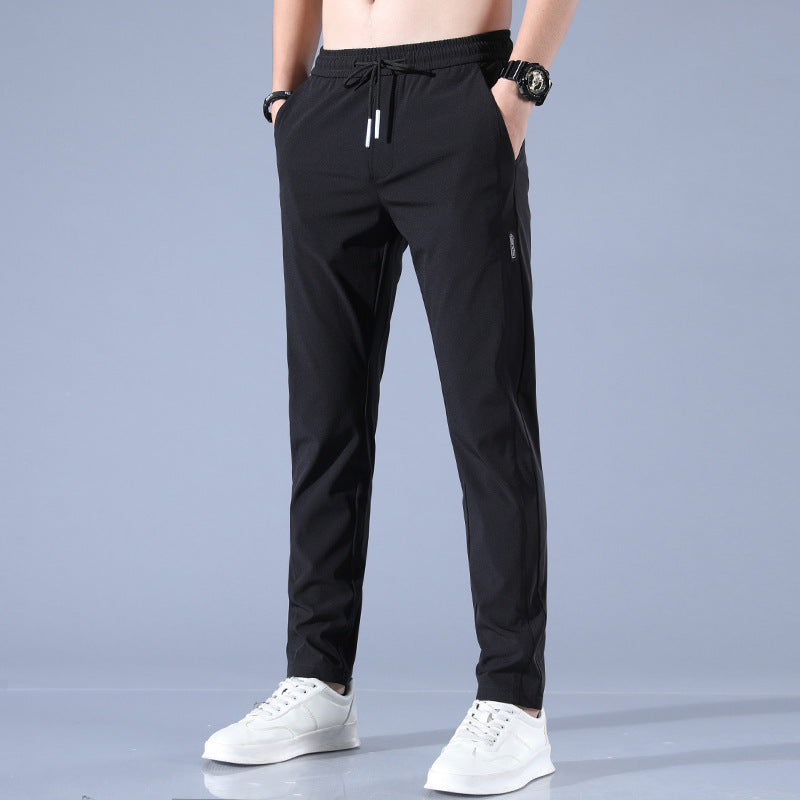 "Pantalon homme réversible, design élégant, tissu stretch, confort pour golf, léger et respirant, couleur neutre."