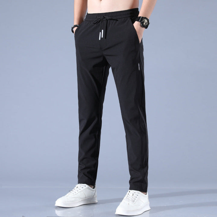 "Pantalon homme réversible, design élégant, tissu stretch, confort pour golf, léger et respirant, couleur neutre."