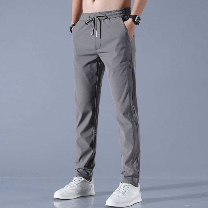 "Pantalon homme réversible, design élégant, tissu stretch, confort pour golf, léger et respirant, couleur neutre."