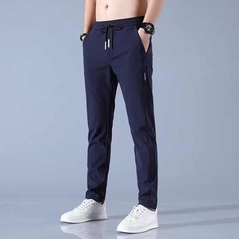 "Pantalon homme réversible, design élégant, tissu stretch, confort pour golf, léger et respirant, couleur neutre."