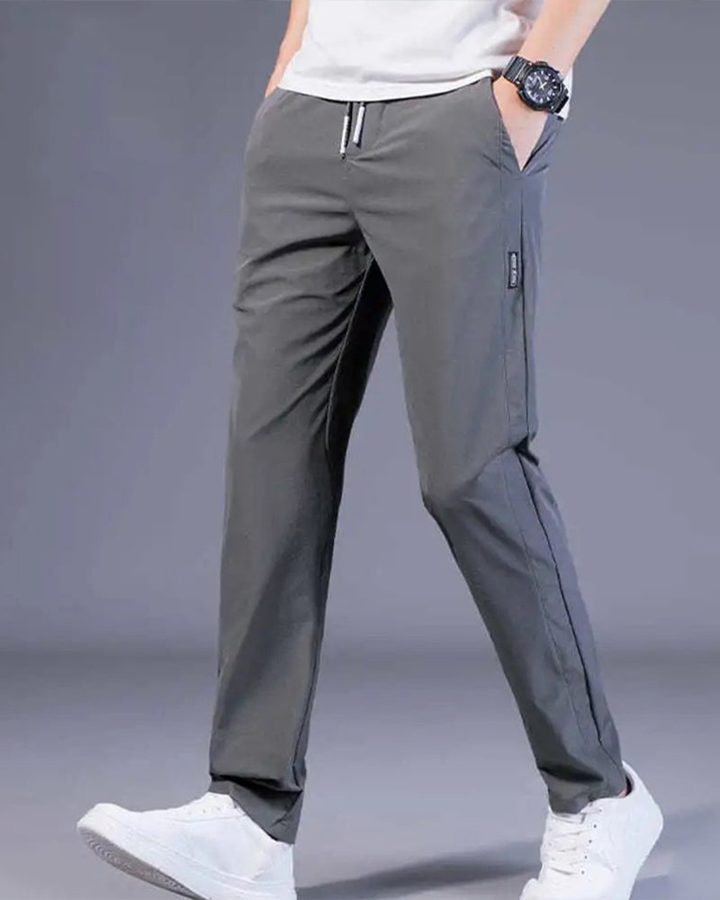 Pantalon homme, séchage rapide, flexible. Coupe moderne et confortable, idéal sport et loisirs.