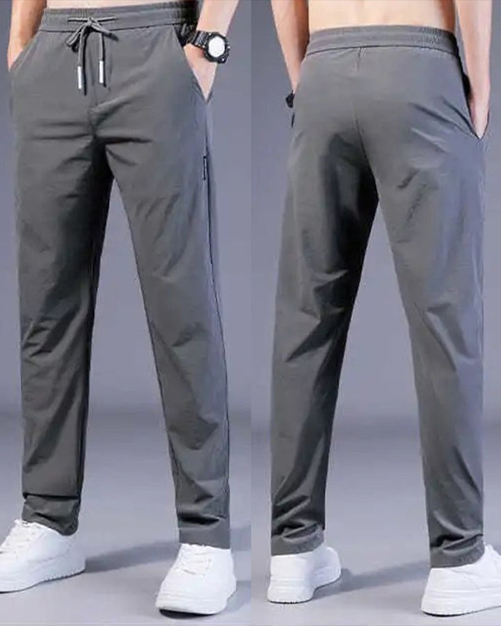 Pantalon homme, séchage rapide, flexible. Coupe moderne et confortable, idéal sport et loisirs.