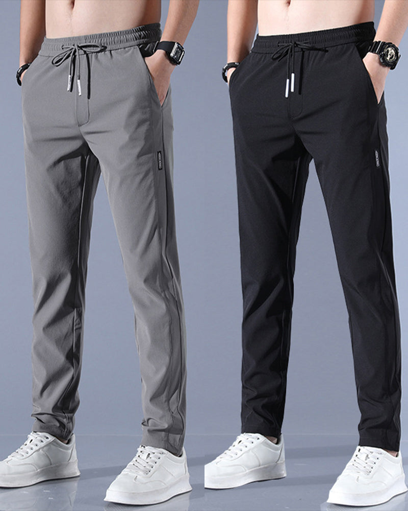 Pantalon homme, séchage rapide, flexible. Coupe moderne et confortable, idéal sport et loisirs.