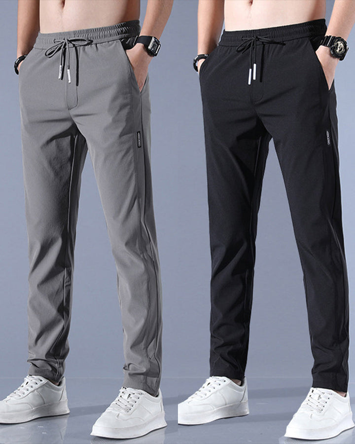 Pantalon homme, séchage rapide, flexible. Coupe moderne et confortable, idéal sport et loisirs.