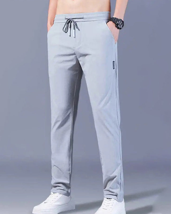 Pantalon homme, séchage rapide, flexible. Coupe moderne et confortable, idéal sport et loisirs.