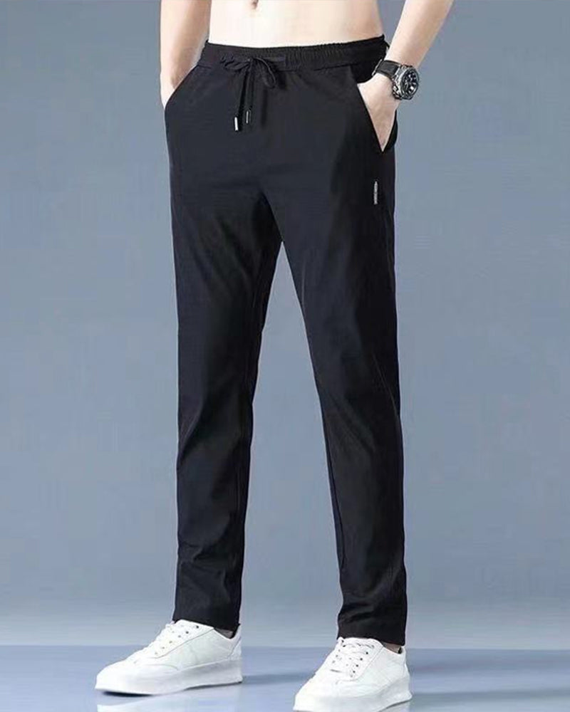 Pantalon homme, séchage rapide, flexible. Coupe moderne et confortable, idéal sport et loisirs.