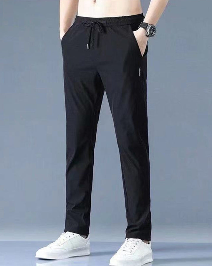 Pantalon homme, séchage rapide, flexible. Coupe moderne et confortable, idéal sport et loisirs.
