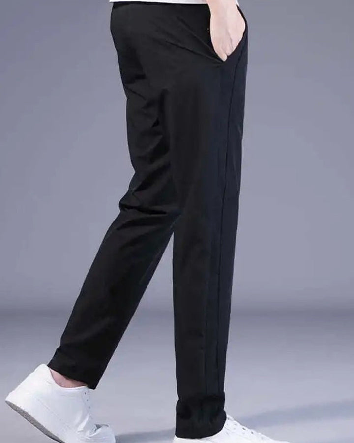 Pantalon homme, séchage rapide, flexible. Coupe moderne et confortable, idéal sport et loisirs.