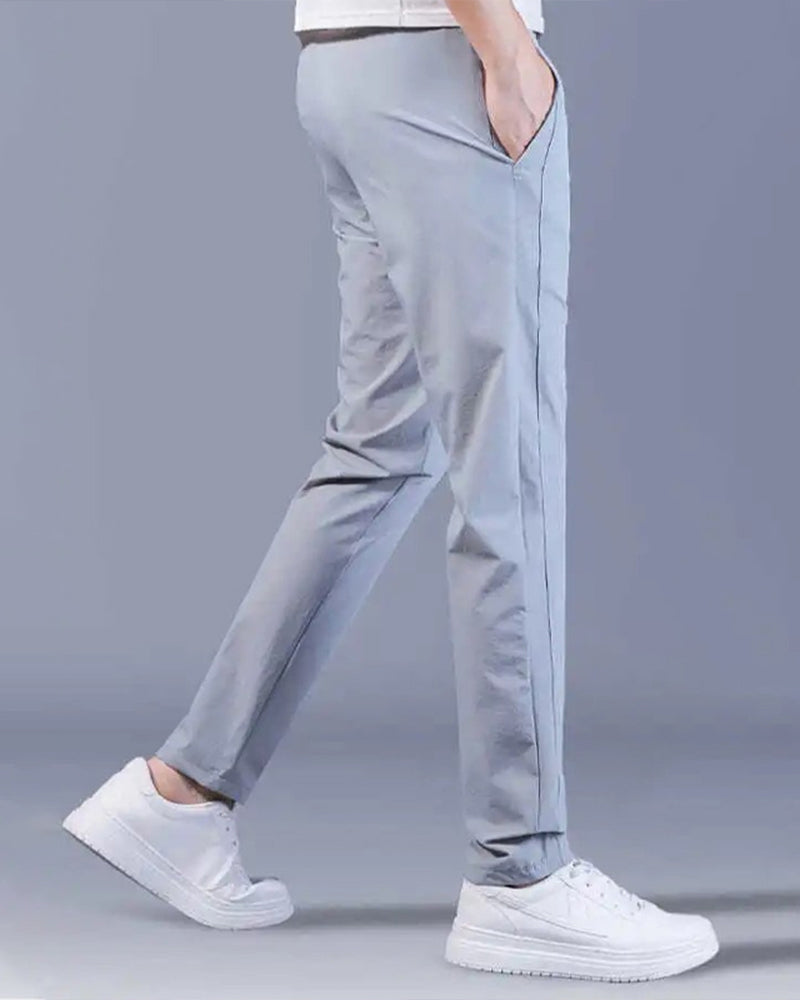 Pantalon homme, séchage rapide, flexible. Coupe moderne et confortable, idéal sport et loisirs.