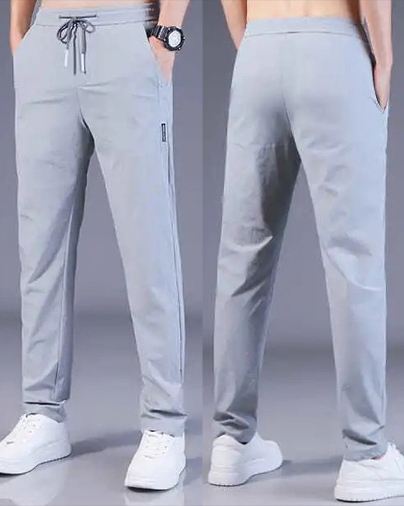 Pantalon homme, séchage rapide, flexible. Coupe moderne et confortable, idéal sport et loisirs.
